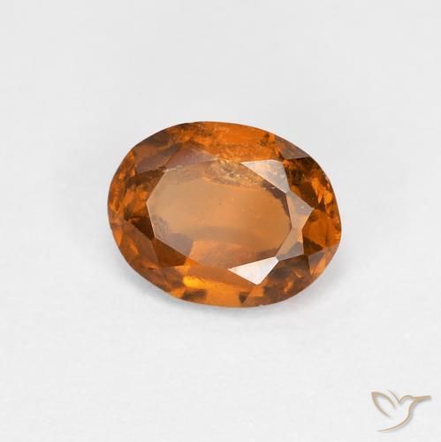 granate hessonita Naranja amarillento natural de 0.78 ct, Ovalada, VS