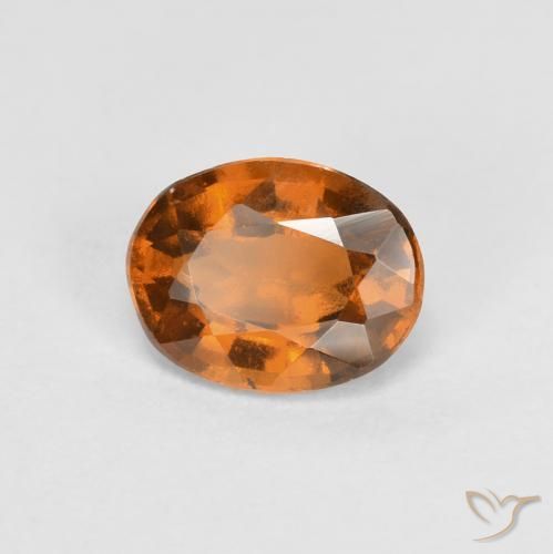 granate hessonita Naranja oscuro natural de 0.83 ct, Ovalada, VS