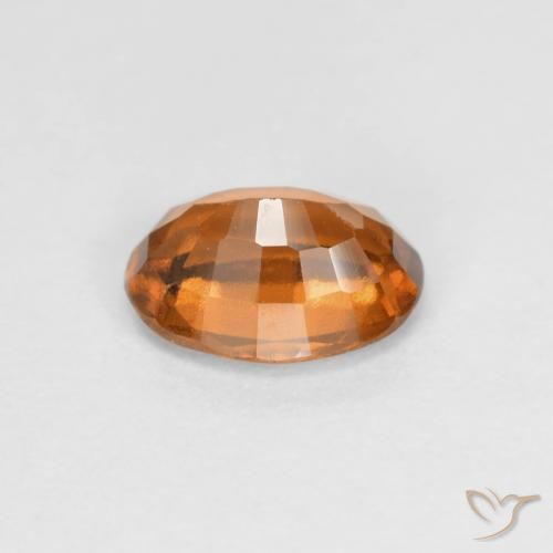 granate hessonita Naranja oscuro natural de 0.83 ct, Ovalada, VS