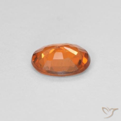 granate hessonita Naranja oscuro natural de 0.82 ct, Ovalada, VVS-VS