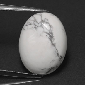 Howlita blanco natural de 7,41 ct, corte óvalo, opaco