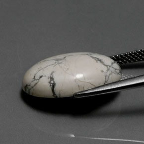 Howlita blanco verdoso natural de 9,98 ct, corte óvalo, opaco