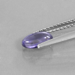 Iolita azul natural de 0,55 ct, corte óvalo, transparente