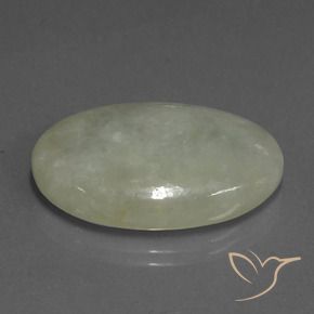 Jadeíta Verde claro cálido natural de 31.57 ct, Ovalada, Translúcido