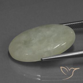 Jadeíta Verde claro cálido natural de 31.57 ct, Ovalada, Translúcido