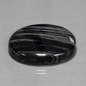 Jaspe negro natural de 54,69 ct, corte óvalo, opaco