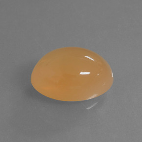 Piedra de luna naranja natural de 6,14 ct, corte óvalo, translúcido