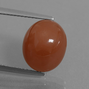 Piedra de luna rojo natural de 6,02 ct, corte óvalo, translúcido