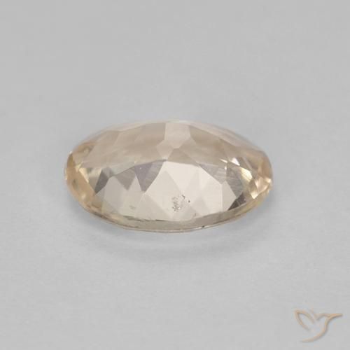 Morganita Dorado claro natural de 0.99 ct, Ovalada, VS