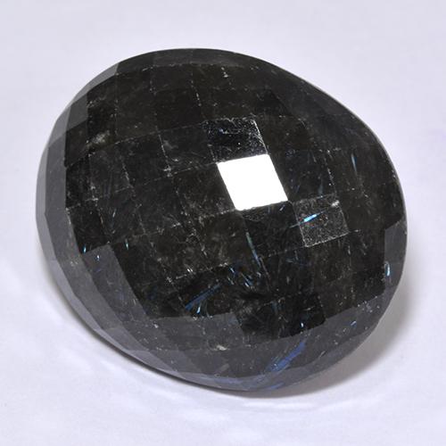 Nuummita negro natural de 29,81 ct, corte óvalo, opaco