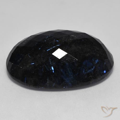 Nuummite Negro con destello azul natural de 24.70 ct, Ovalada, Opaco