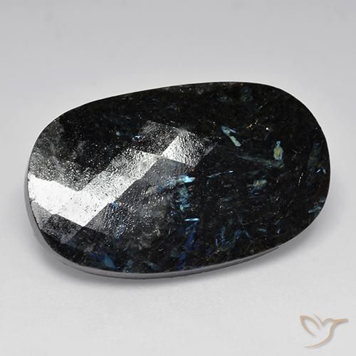 Nuummite Negro con destello azul natural de 24.26 ct, Ovalada, Opaco