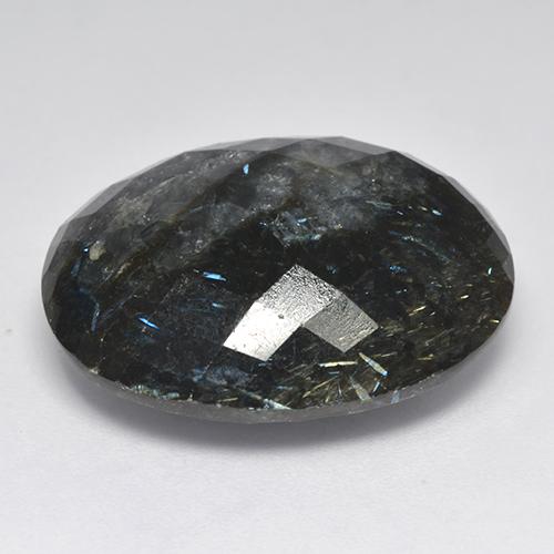 Nuummita negro con destello azul natural de 33,44 ct, corte óvalo, opaco