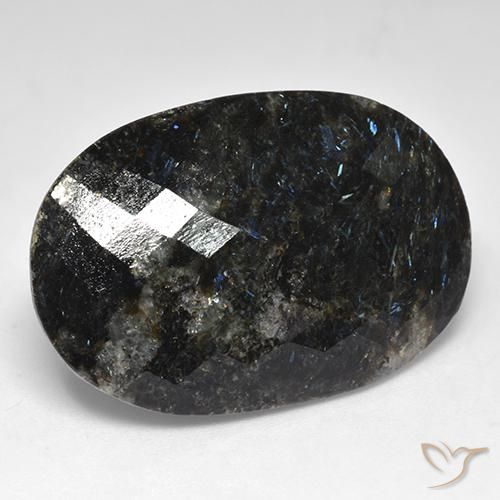 Nuummite Negro con destello azul natural de 28.03 ct, Ovalada, Opaco