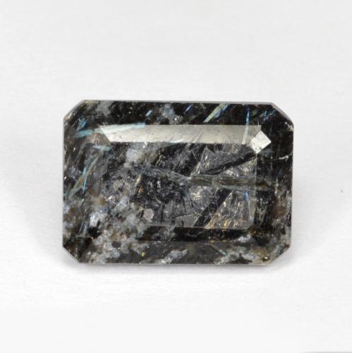 Nuummite Negro con destello azul natural de 6.77 ct, corte esmeralda, Opaco