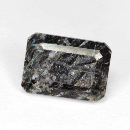 Nuummite Negro con destello azul natural de 6.77 ct, corte esmeralda, Opaco