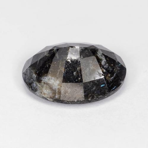 Nuummita negro con destello azul natural de 8,47 ct, corte óvalo, opaco