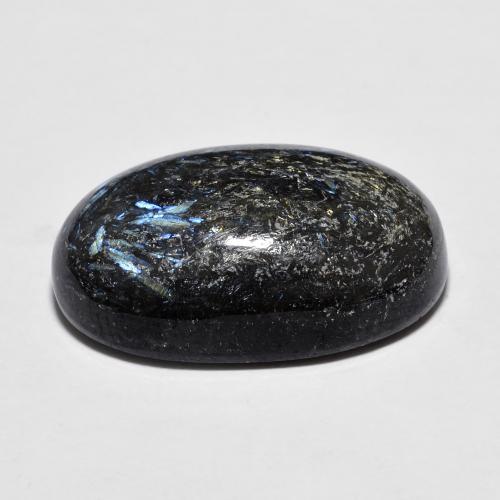 Nuummita negro natural de 11,98 ct, corte óvalo, opaco