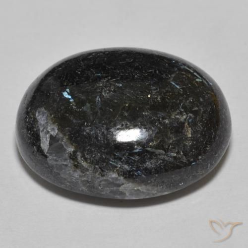 Nuummite Negro con destello azul natural de 24.48 ct, Ovalada, Opaco