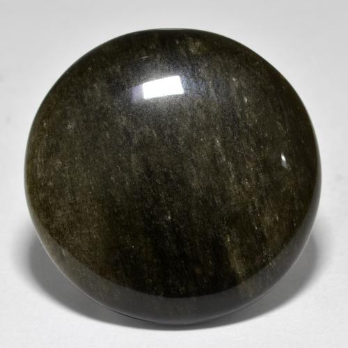 Obsidiana Negro con brillo dorado natural de 34.66 ct, Corte Redondo, Opaco