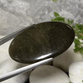 Obsidiana Negro dorado brillante natural de 31.63 ct, Corte Óvalo, Opaco