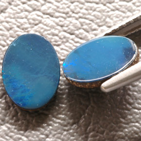 Gemas de doblete de ópalo multicolor natural de  ct, corte óvalo, opaco