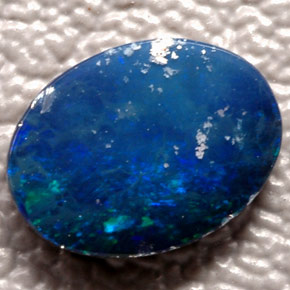 Doblete de ópalo multicolor natural de 0,66 ct, corte óvalo, opaco