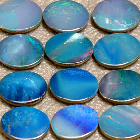 Gemas de doblete de ópalo multicolor natural de  ct, corte óvalo, opaco