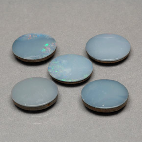 Gemas de doblete de ópalo multicolor natural de  ct, corte óvalo, opaco