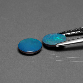 Gemas de doblete de ópalo multicolor natural de  ct, corte óvalo, opaco