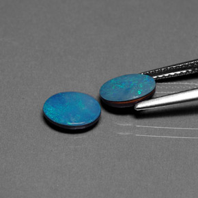 Gemas de doblete de ópalo multicolor natural de  ct, corte óvalo, opaco