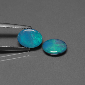 Gemas de doblete de ópalo multicolor natural de  ct, corte óvalo, opaco