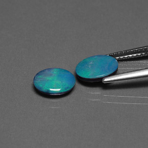 Gemas de doblete de ópalo multicolor natural de  ct, corte óvalo, opaco