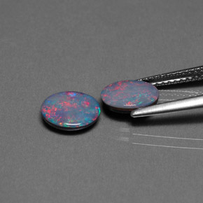 Gemas de doblete de ópalo multicolor natural de  ct, corte óvalo, opaco
