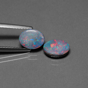 Gemas de doblete de ópalo multicolor natural de  ct, corte óvalo, opaco
