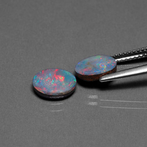 Gemas de doblete de ópalo multicolor natural de  ct, corte óvalo, opaco