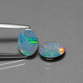 Gemas de doblete de ópalo multicolor natural de  ct, corte óvalo, opaco
