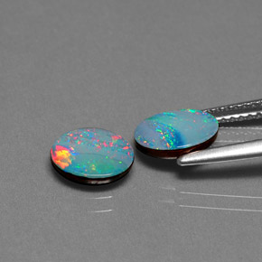 Gemas de doblete de ópalo multicolor natural de  ct, corte óvalo, opaco