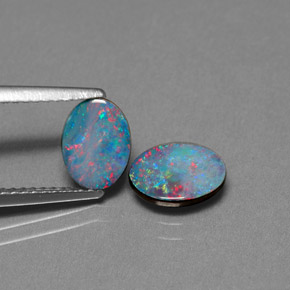 Gemas de doblete de ópalo multicolor natural de  ct, corte óvalo, opaco