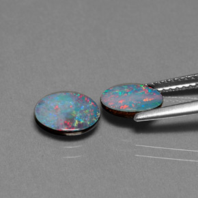 Gemas de doblete de ópalo multicolor natural de  ct, corte óvalo, opaco