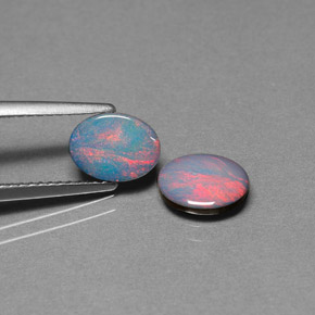 Gemas de doblete de ópalo multicolor natural de  ct, corte óvalo, opaco