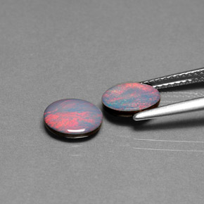 Gemas de doblete de ópalo multicolor natural de  ct, corte óvalo, opaco