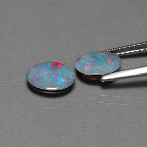 Gemas de doblete de ópalo multicolor natural de  ct, corte óvalo, opaco