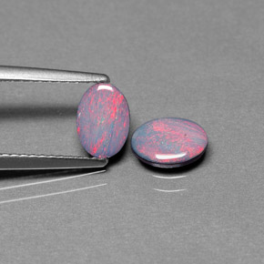 Gemas de doblete de ópalo multicolor natural de  ct, corte óvalo, opaco
