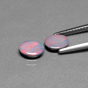 Gemas de doblete de ópalo multicolor natural de  ct, corte óvalo, opaco
