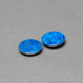 Gemas de doblete de ópalo multicolor natural de  ct, corte óvalo, opaco