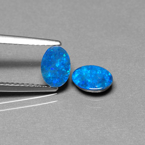 Gemas de doblete de ópalo multicolor natural de  ct, corte óvalo, opaco