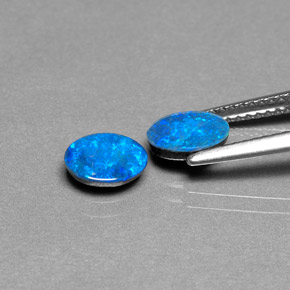 Gemas de doblete de ópalo multicolor natural de  ct, corte óvalo, opaco