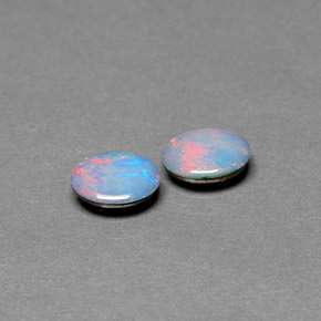 Gemas de doblete de ópalo multicolor natural de  ct, corte óvalo, opaco
