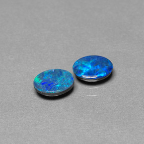 Gemas de doblete de ópalo multicolor natural de  ct, corte óvalo, opaco